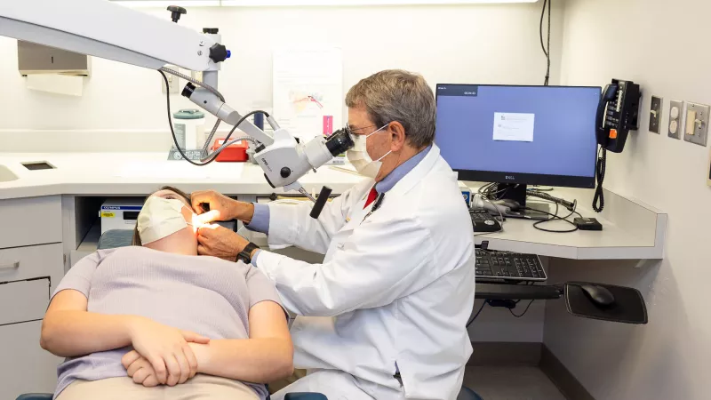 Bruce Gantz with simulated patient in the Otolaryngology clinic on Tuesday, Sept. 20, 2022.