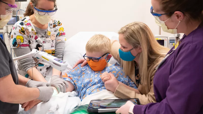 UI Health Care providers with a patient