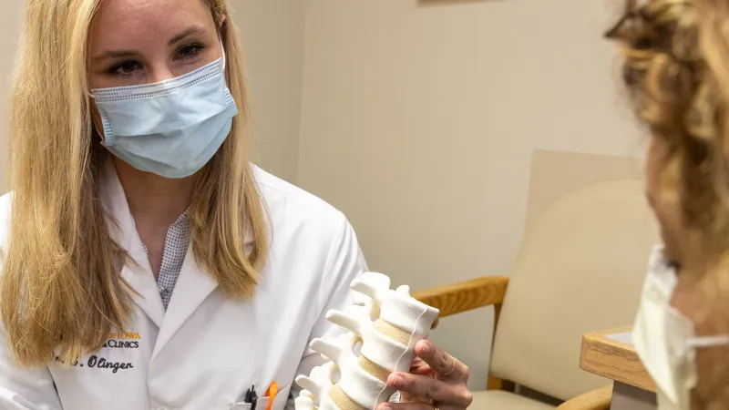 Dr. Ollinger with patient
