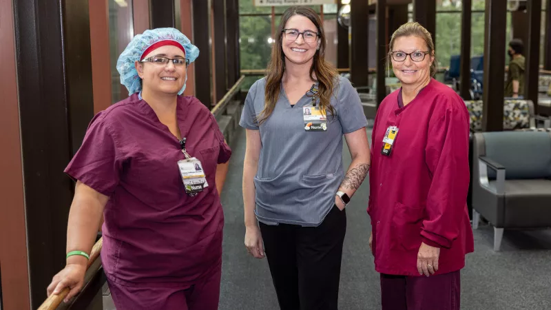 Julie Liebe, Courtney Heid and Kelsey Deweese, photographed on Monday, Sept. 11, 2023. The three nurses were leaving work in June 2023 when a visitor to the hospital went into cardiac arrest near the skywalk. Liebe and Deweese performed CPR while Heid retrieved an AED from the main entrance.