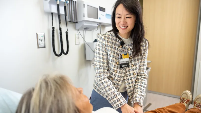 Urologist Helen Hougen, MD, with simulated patient at the urology clinic at UI Health Care Iowa River Landing on Tuesday, Nov. 12, 2024.