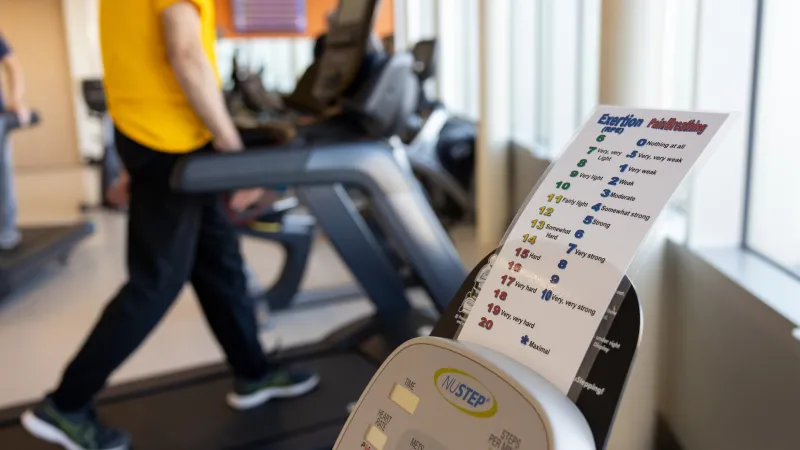 Cardiac rehabilitation on a treadmill with chart of exertion and pain/breathing at Iowa River Landing on Monday, Dec. 6, 2021. Patient consent on file - Neil Reske.