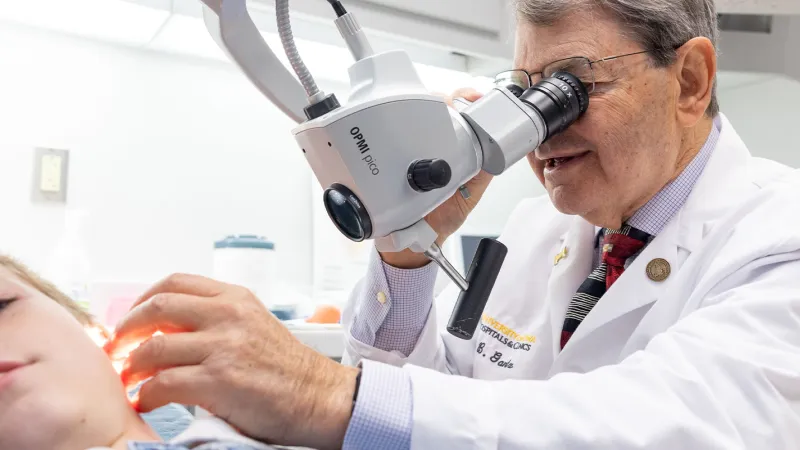 Bruce J. Gantz, MD, examines a simulated pediatric patient in the otolaryngology clinic at UI Health Care university campus with simulated patients on Wednesday, Oct. 9, 2024.