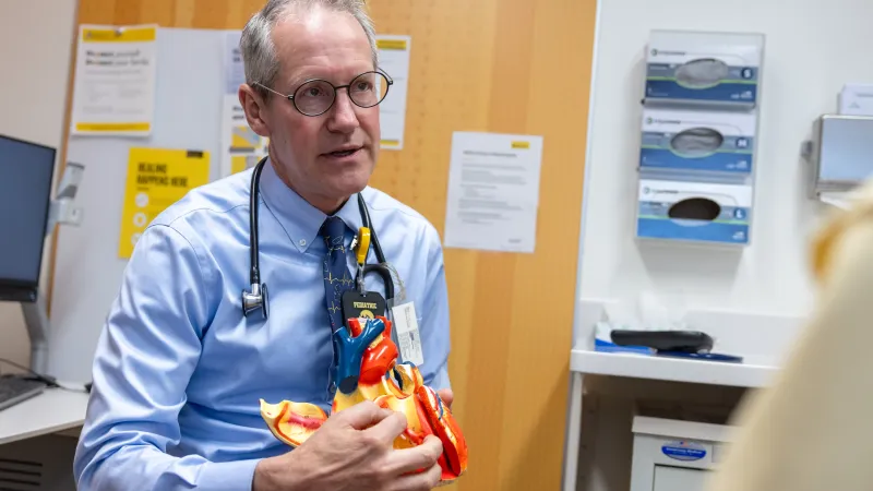 Ian Law, MD, with patient in the UI Stead Family Children’s Hospital Pediatric Specialty Clinic