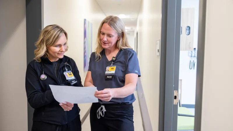 Nurses examine x-ray to determine care