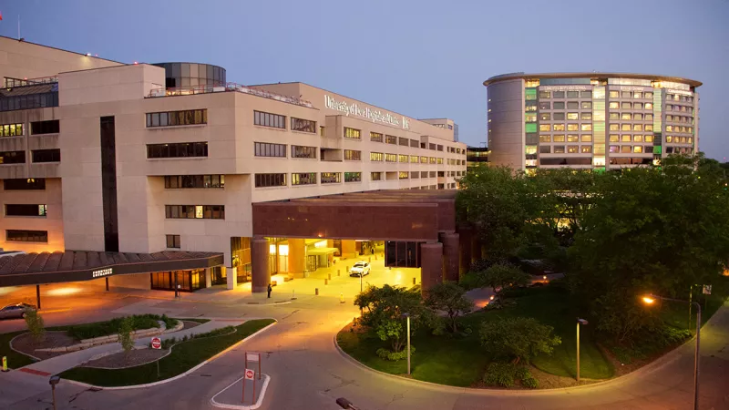 Exterior twilight view of UI Hospitals and Clinics