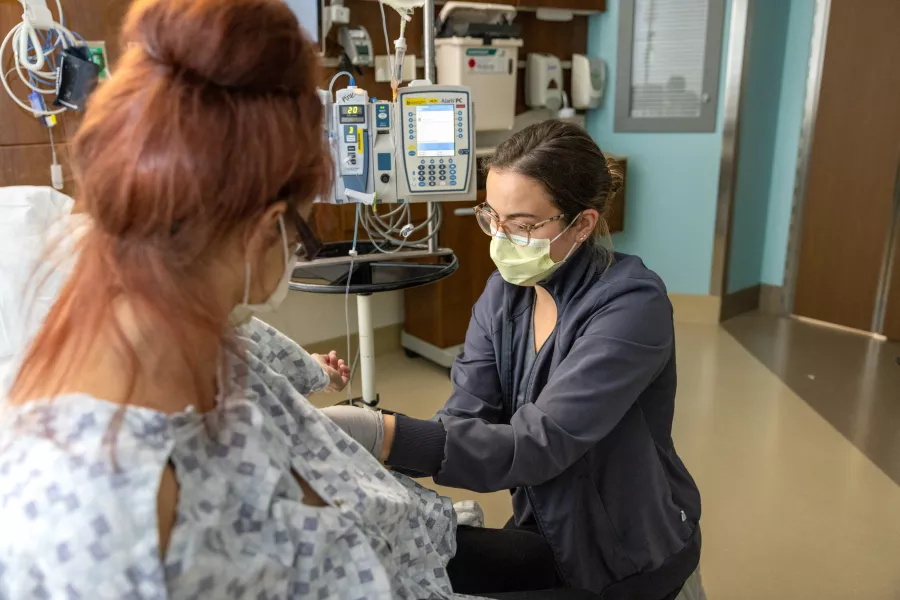 Nurse examining patient