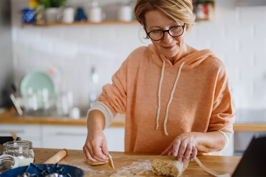 Total joint patient baking in their kitchen