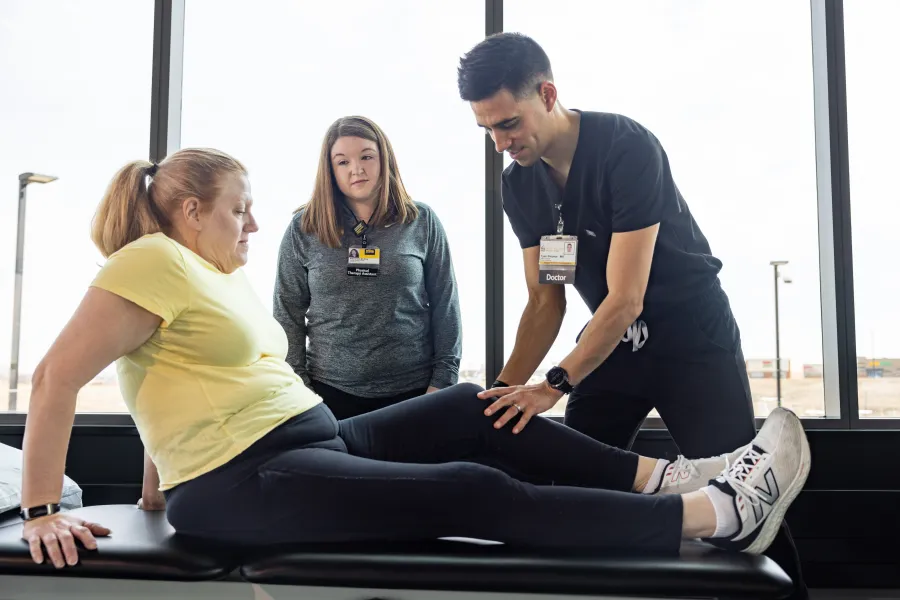 Physical therapist assistant Alyssa Villo with simulated patient at the physical therapy gym at UI Health Care Medical Center North Liberty on Monday, Feb. 24, 2025. 