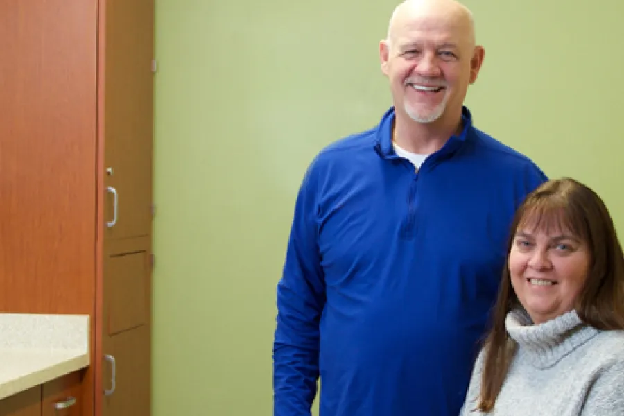 A couple in a clinic exam room