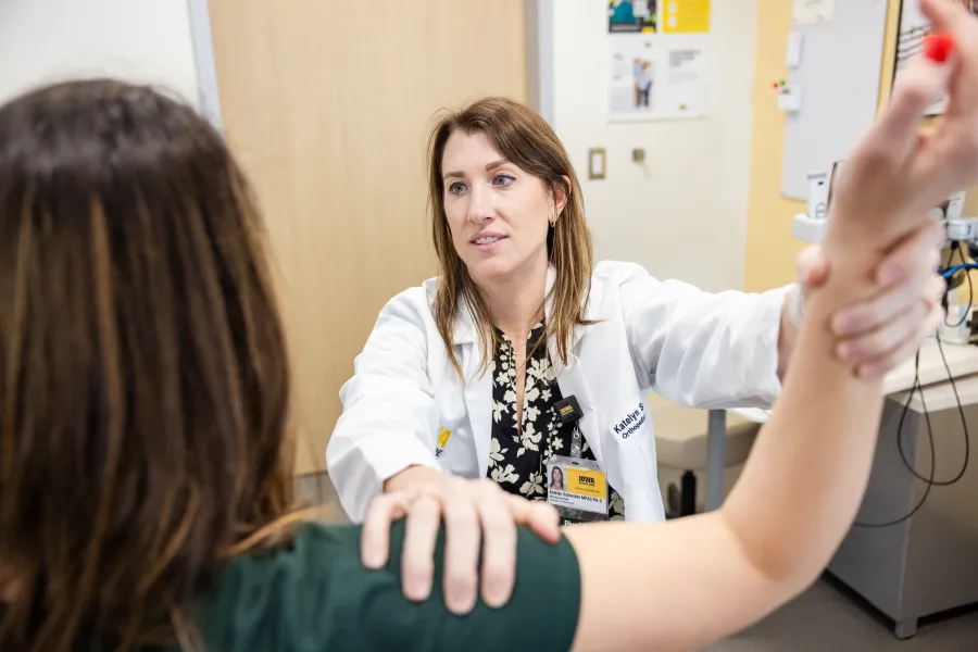 Physician assistant treats patient at Medical Center North Liberty