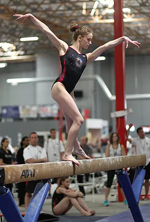 Sports Photos USA - The beam and floor events at a girls' gymnastics meet  contain a myriad of beautiful and photo-worthy moments. One of the classic  skills is the scale. I have