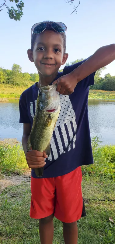 Eli holding a fish