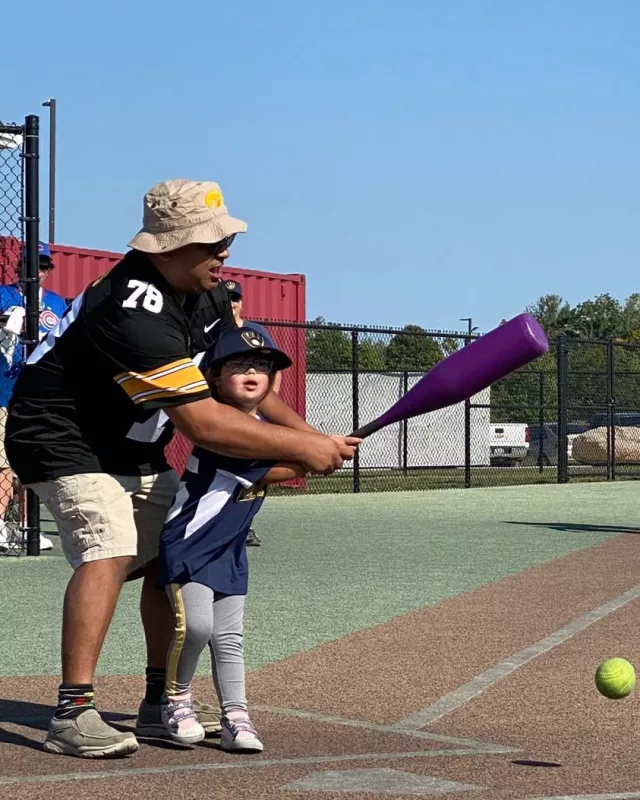 Anjali Sahu playing softball