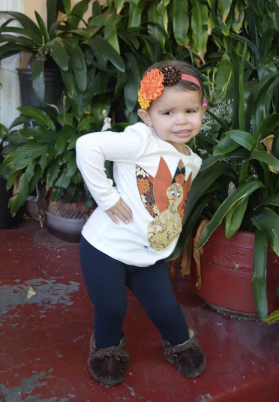 Eve Jimenez wearing a turkey shirt