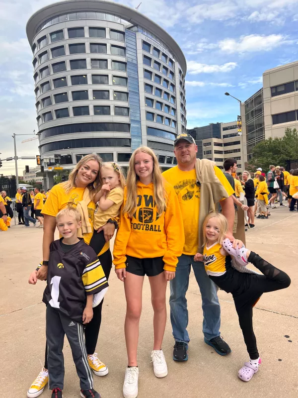 Carver Meiner and family attending a University of Iowa football game