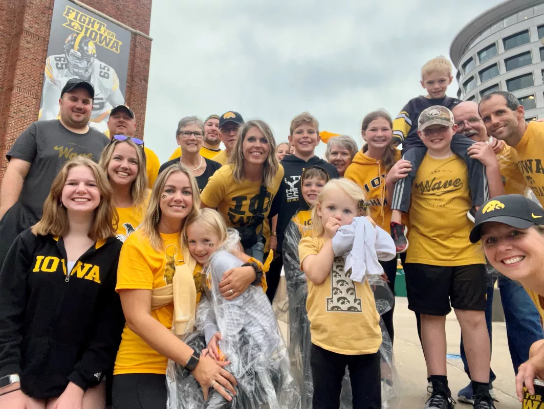 Carver Meiner and family attending a University of Iowa football game