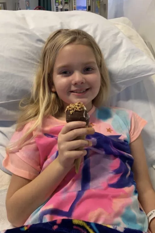 Elyna Clements hospital stay eating ice cream