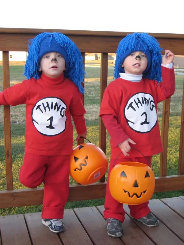 Gavin Miller and twin wearing matching Halloween costumes
