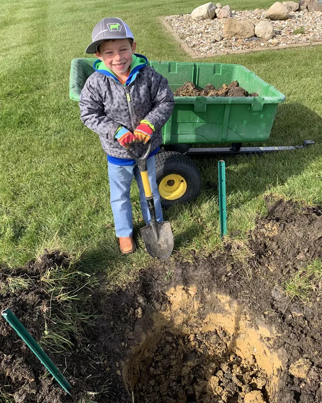 Tate Manahl playing outside