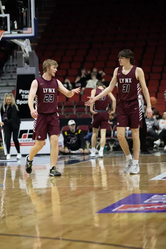 Dylan Kurt high fives team mate