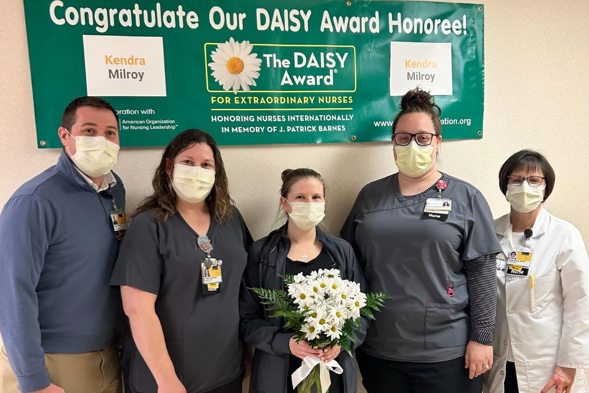 Kendra Milroy, RN, in a group photo of the Adult Surgical Specialty Unit