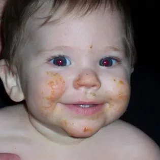 Gabby Ford as a baby with food on her face