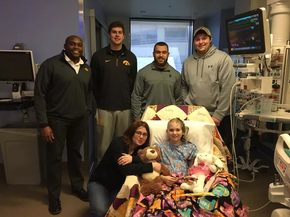 Gabby Ford visited by Hawkeye athletes, 2017