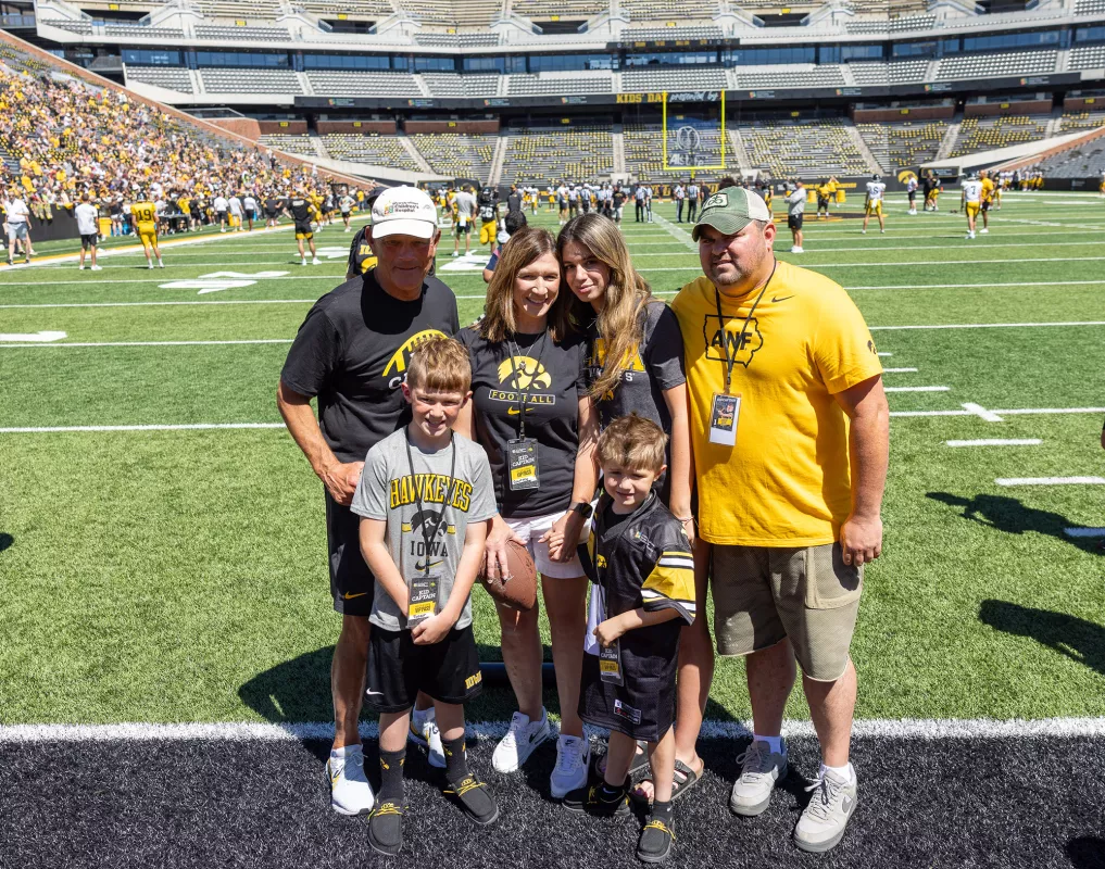 Veach family with Kirk Ferentz on Kids Day