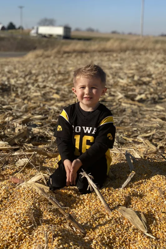 Lincoln Veach playing in the corn field