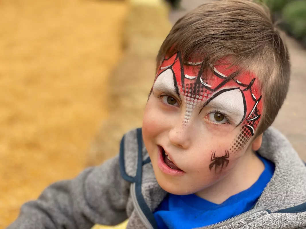 Kid Captain Bentley Erickson with his face painted like Spiderman