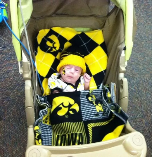 Bentley Erickson as an infant in stroller