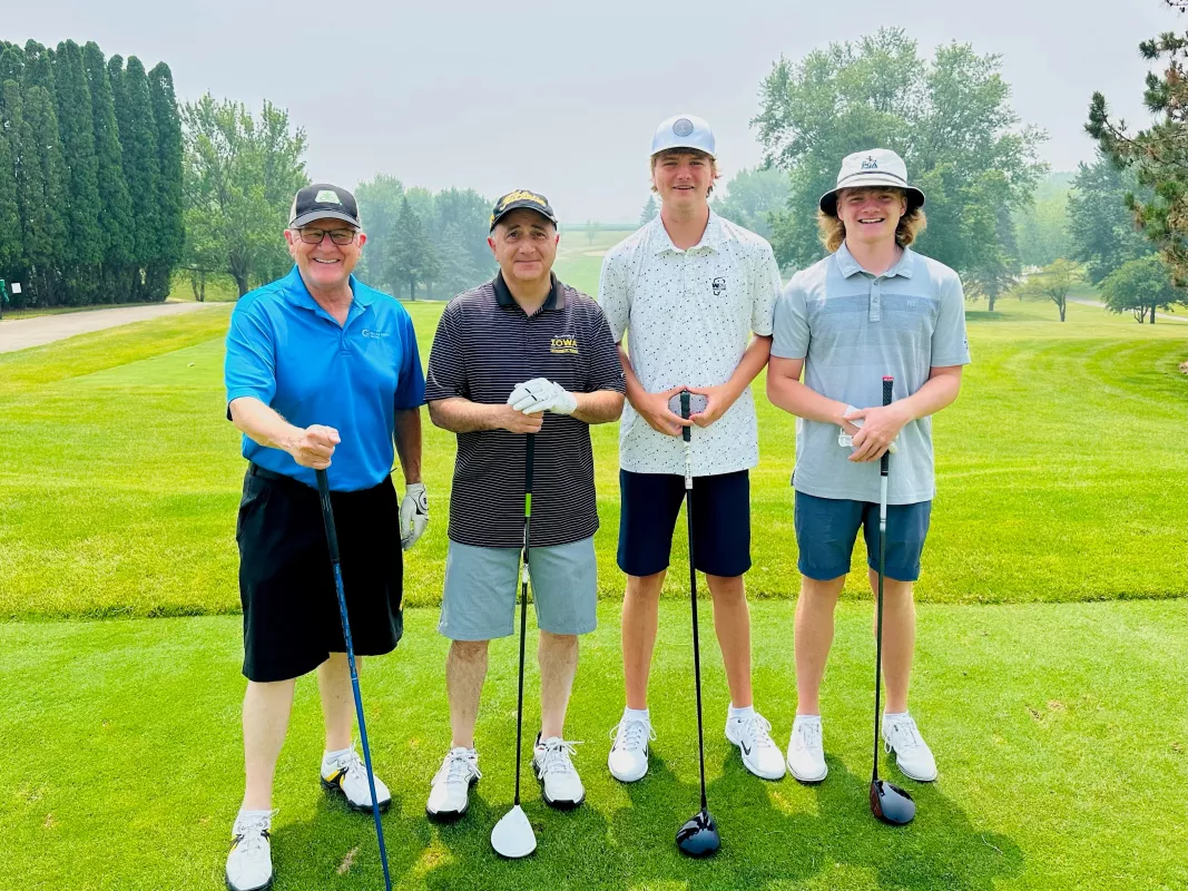 Group photo of Jackson Webber and Dr. Cassim Igram and Brayden Webber and Gary Dolphin