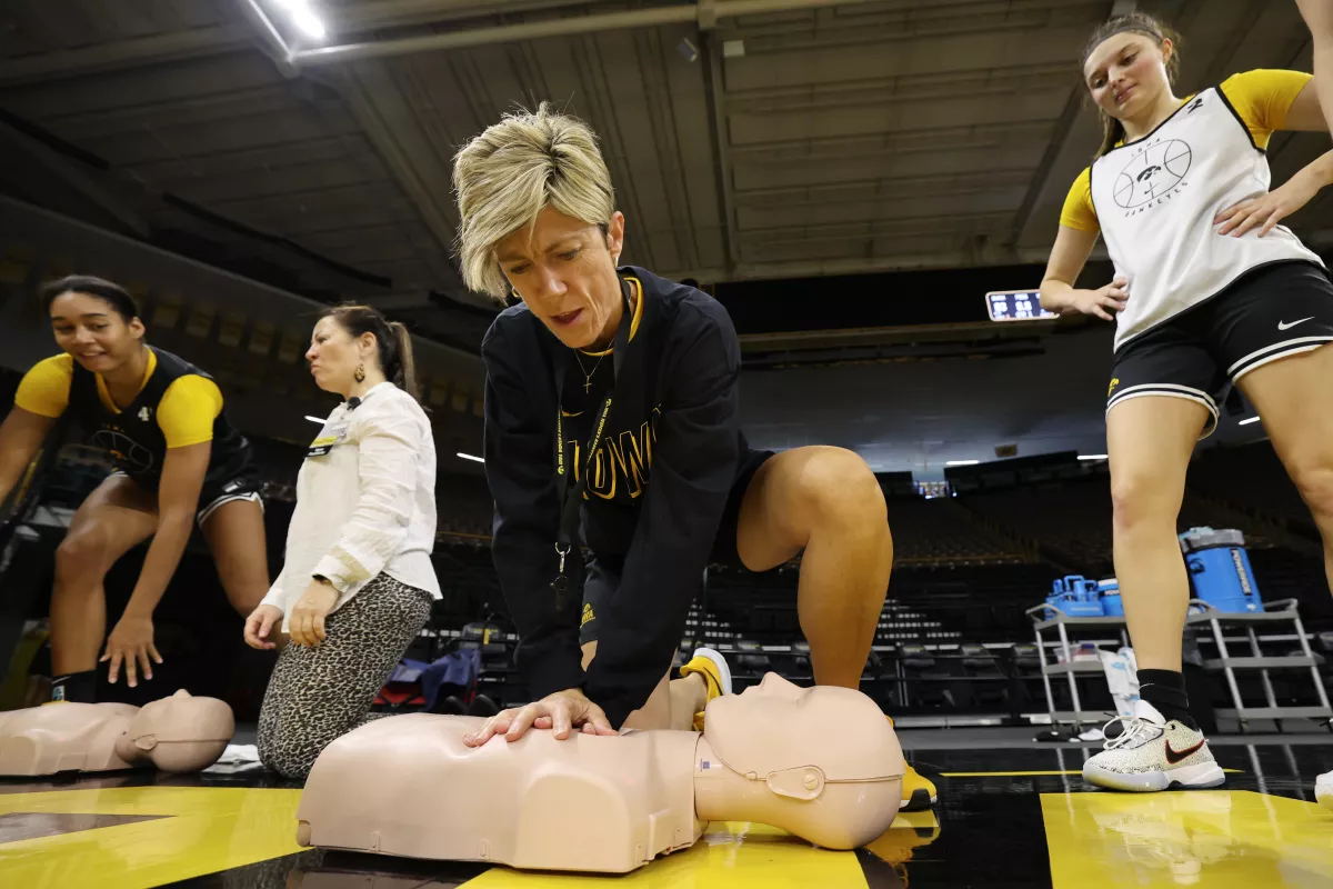 Iowa Women's basketball practicing CPR training