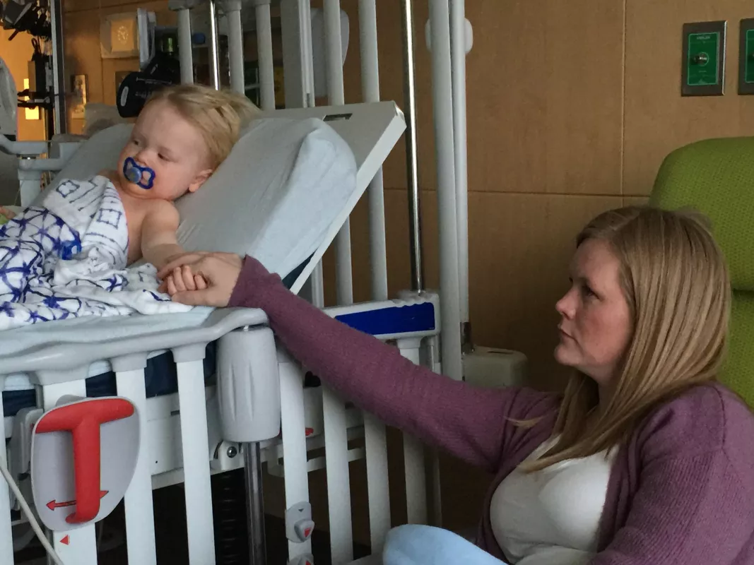 Atlas coleman holding hands with his mother