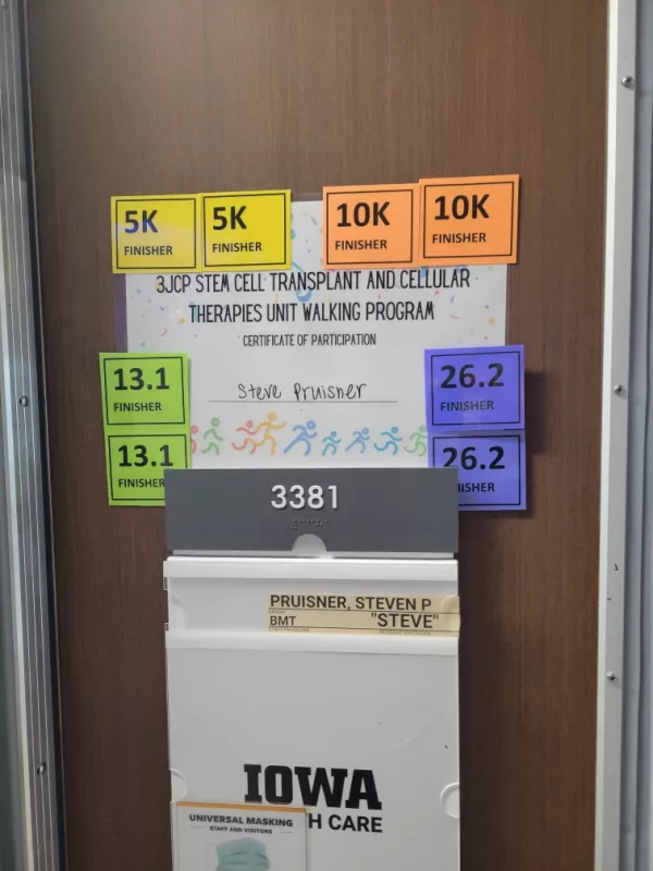 Steve Pruisner's patient door displaying miles complete