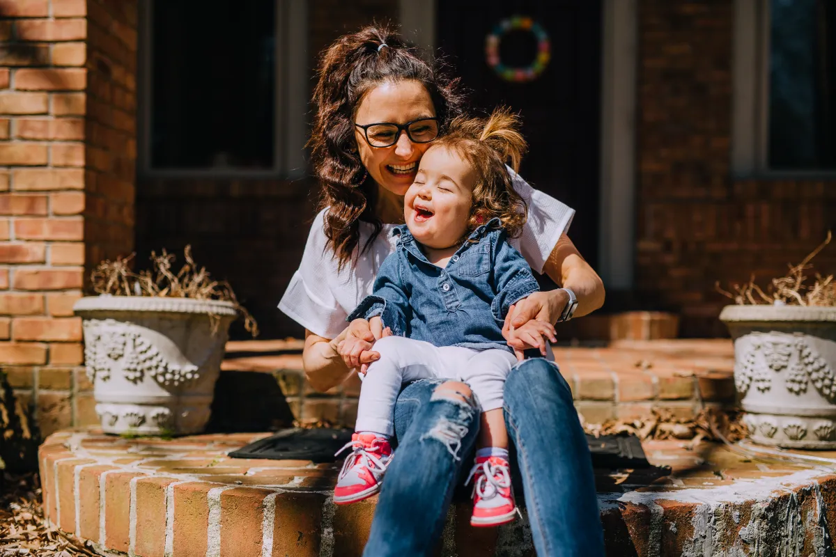 Kid Captain Gwendolyn Clouse with her mother