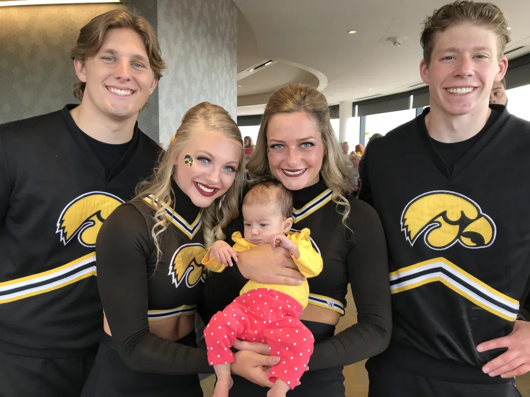 Kid Captain Gwendolyn Clouse and University of Iowa Hawkeye Cheerleaders