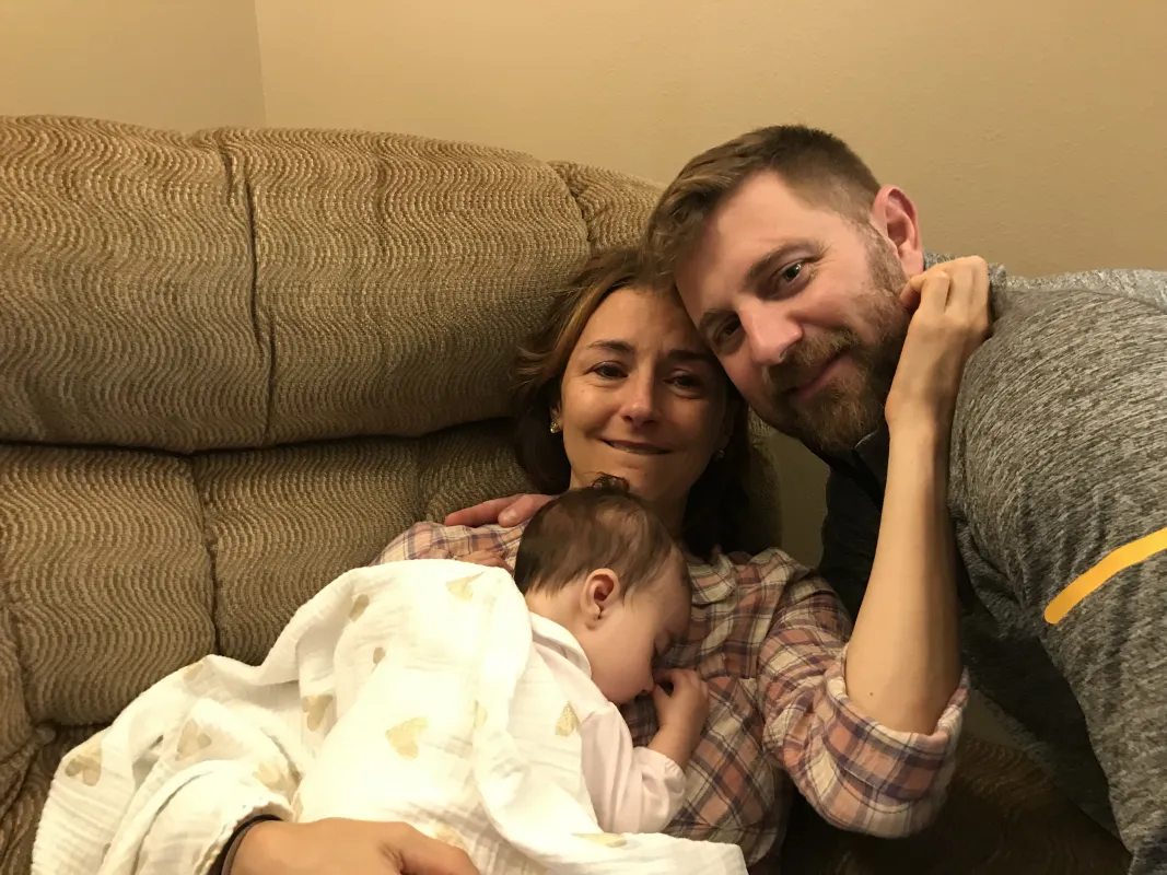 Kid Captain Gwendolyn Clouse with her mother and father