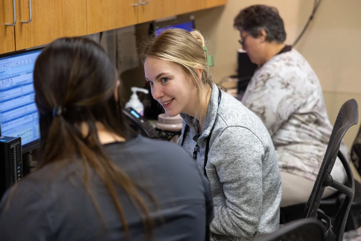 Nurses give their shift reports to the day shift in the 4C Surgical/Ortho inpatient unit at the University of Iowa Health Care Medical Center Downtown on Tuesday, April 2, 2024. Screen has been blurred.