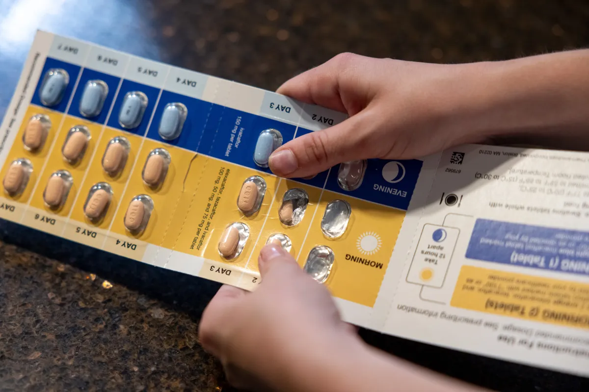 Grace Lidgett takes a dose of Trikafta on Thursday, July 31, 2025. Grace was diagnosed with cystic fibrosis as an infant, and through therapies that included Ofkambi and now Trikafta, has been able to live an active life that included running on her high school track and cross country teams.