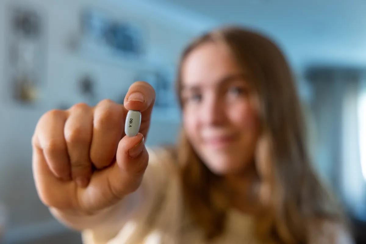 Grace Lidgett takes a dose of Trikafta on Thursday, July 31, 2025. Grace was diagnosed with cystic fibrosis as an infant, and through therapies that included Ofkambi and now Trikafta, has been able to live an active life that included running on her high school track and cross country teams.