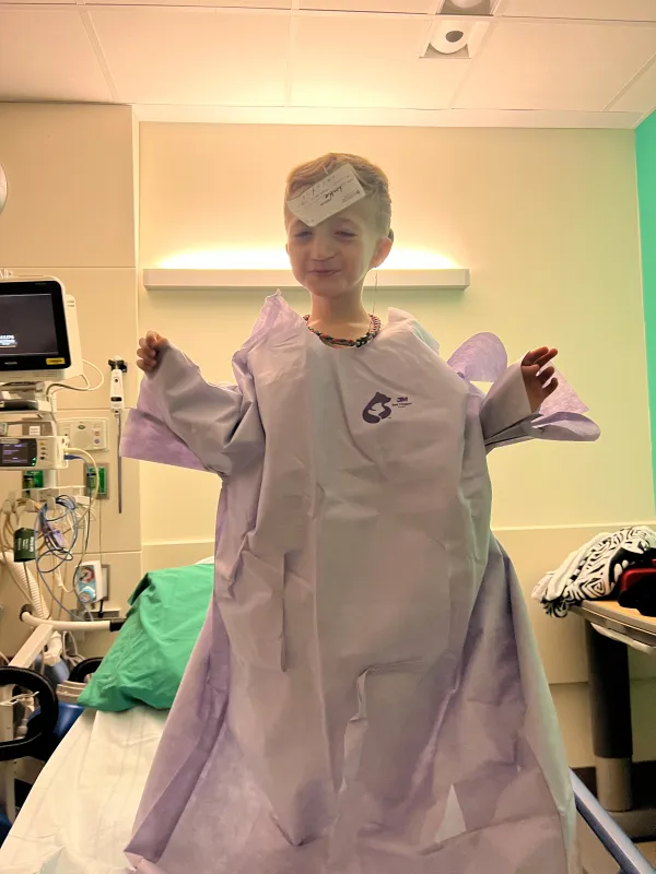 Kid Captain Luke Johnston in a Halloween ghost costume