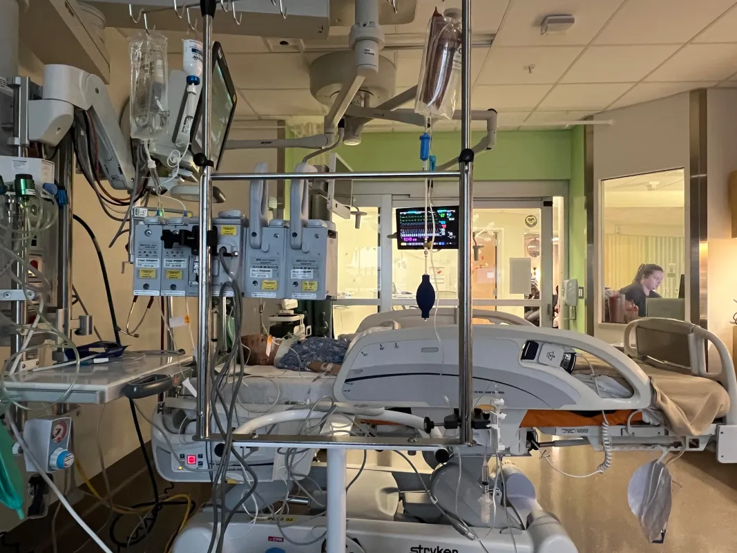 Kid Captain Luke Johnston in a hospital room, surrounded by machines