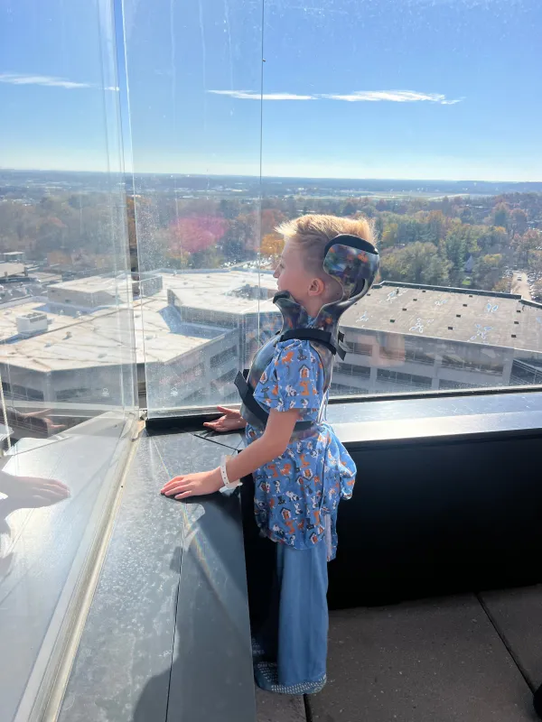 Kid Captain Luke Johnston looking over Kinnick Stadium
