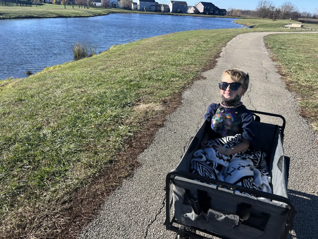 Kid Captain Luke Johnston being pulled in a cart