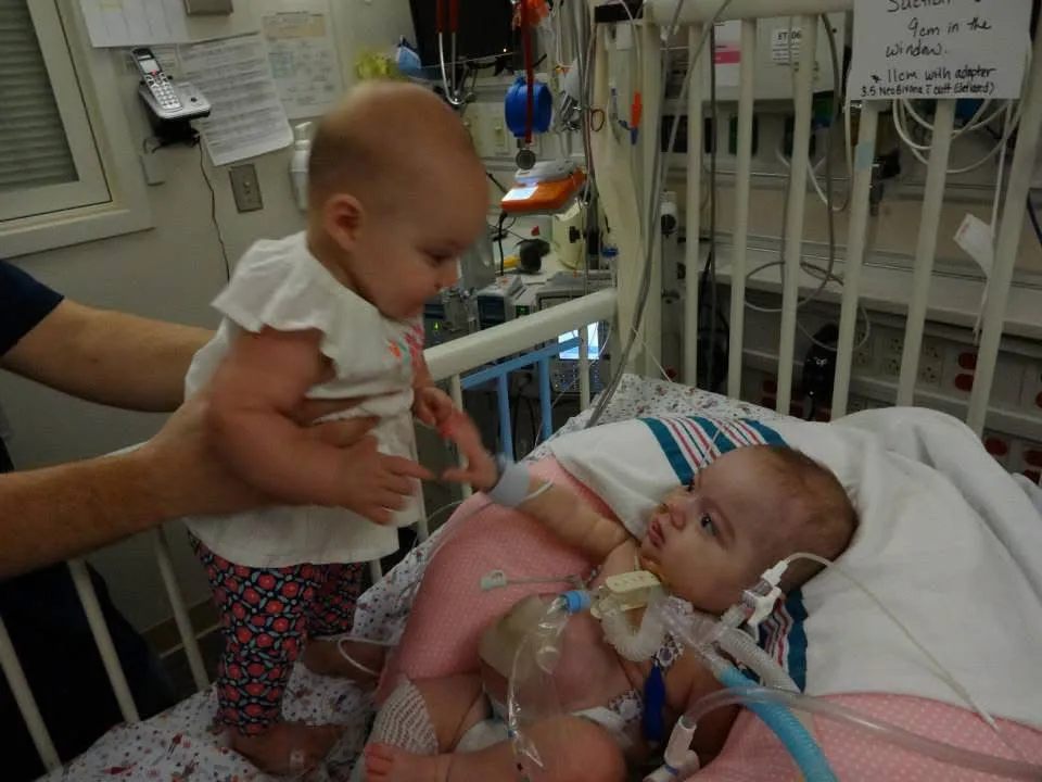 Kid Captain Lily Sebastian and her sister Gemma as babies in the NICU