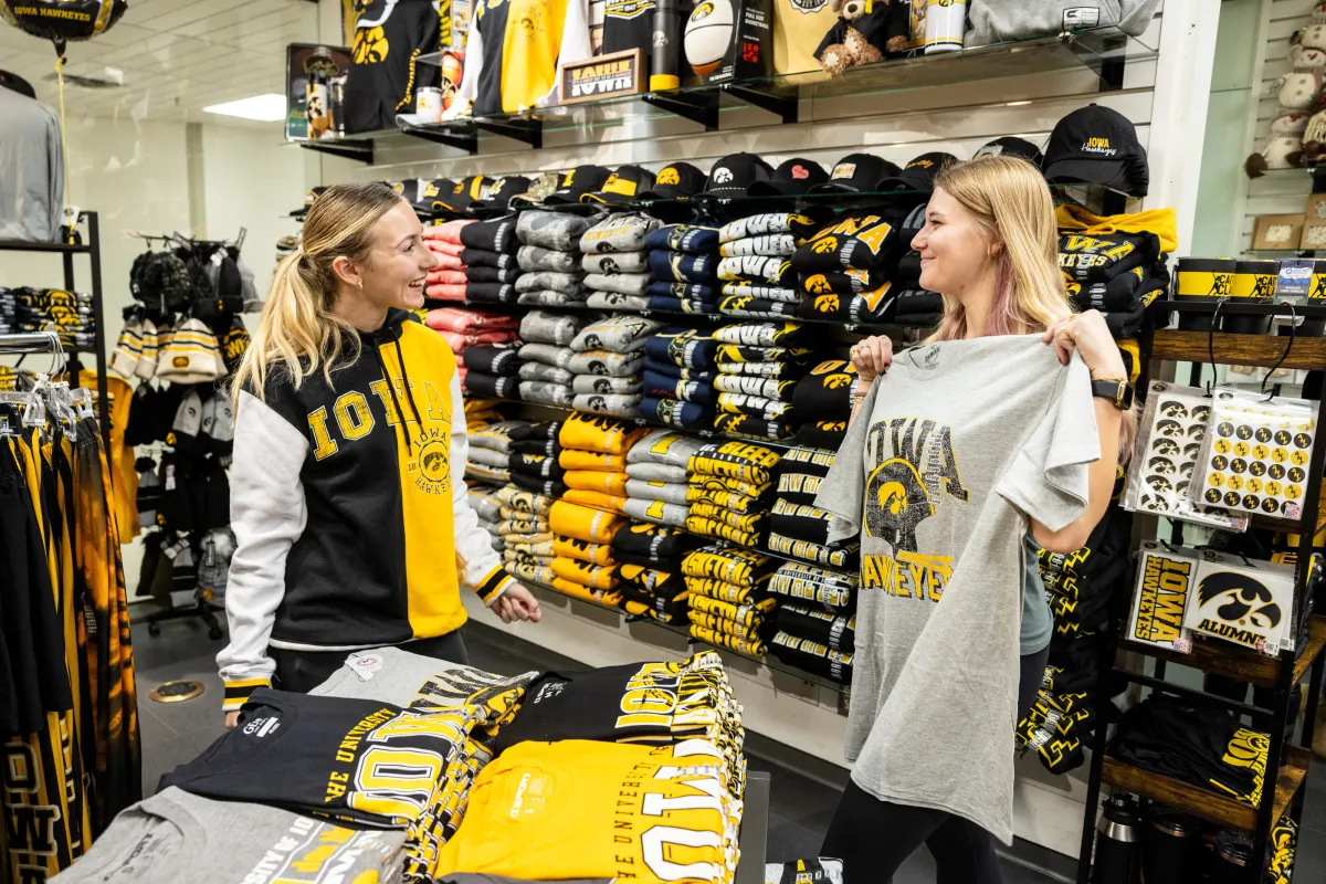 photo of students with Hawkeye gear