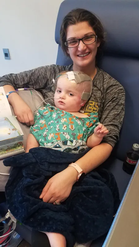Kid captain Ray Walker with his mother in the hospital