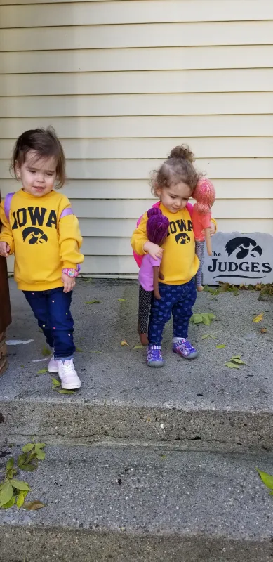 Kid captain Millie Judge and sister